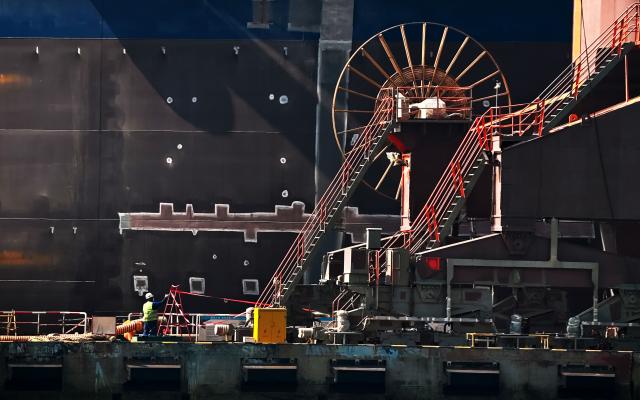A worker is seen at the production and operation area of the Dalian Shipbuilding Industrial Group on the coast of Suoyu Bay in Ganjingzi District of Dalian, in northeastern China's Liaoning province on June 10, 2026. (Photo by CN-STR / AFP) / China OUT