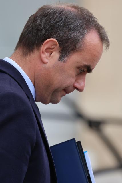 France's Prime Minister Sebastien Lecornu reacts as he leaves after the weekly cabinet meeting at the Elysee Palace in Paris on June 10, 2026. (Photo by Ludovic MARIN / AFP)