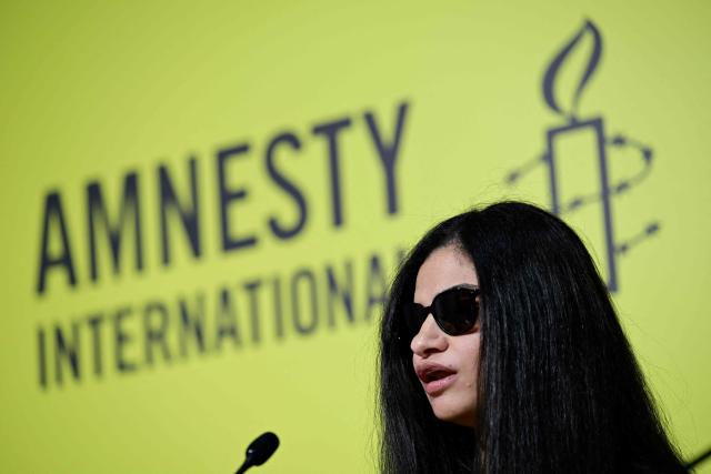 Amnesty International's researcher on Israel and the Occupied Palestinian Territory Budour Hassan attends a press conference on Amnesty International's report, 'Erasing anything Palestinian: Israel’s ethnic cleansing of West Bank Bedouin and herding communities' in Berlin on June 10, 2026. (Photo by John MACDOUGALL / AFP)