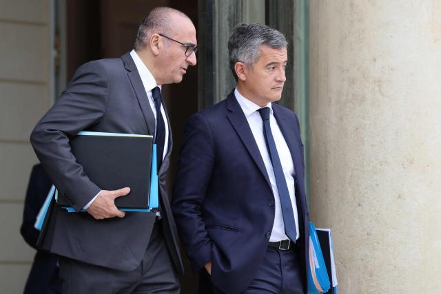 France's Interior Minister Laurent Nunez (L) and France's Justice Minister Gerald Darmanin leave after the weekly cabinet meeting at the Elysee Palace in Paris on June 10, 2026. (Photo by Ludovic MARIN / AFP)