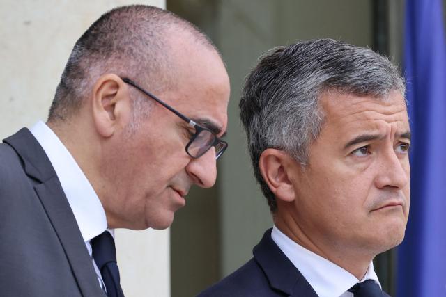France's Interior Minister Laurent Nunez (L) and France's Justice Minister Gerald Darmanin leave after the weekly cabinet meeting at the Elysee Palace in Paris on June 10, 2026. (Photo by Ludovic MARIN / AFP)