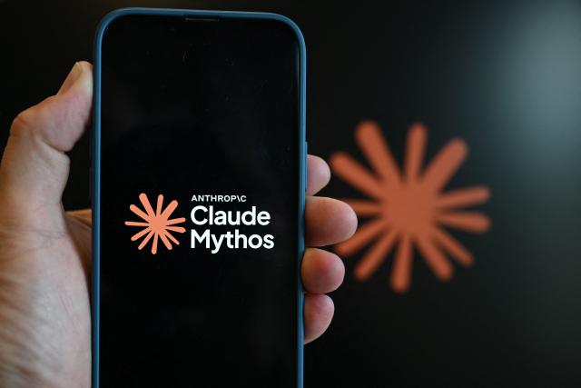 This photograph shows the logo of the AI assistant "Claude Mythos" built by the US artificial intelligence safety and research company Anthropic displayed on a smartphone's screen in Brussels on June 10, 2026. (Photo by Nicolas TUCAT / AFP)