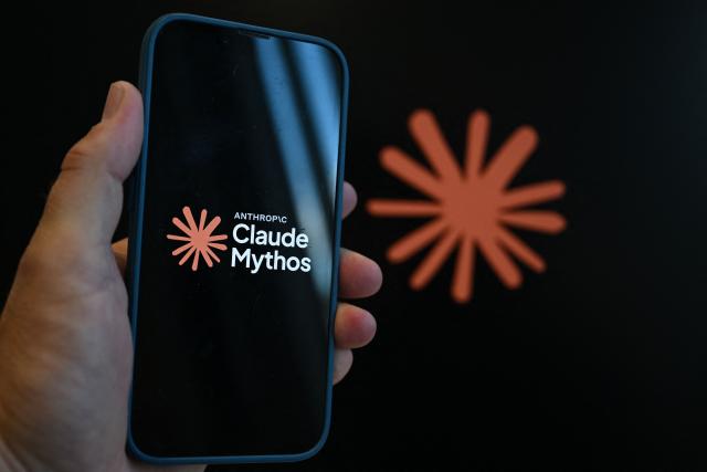 This photograph shows the logo of the AI assistant "Claude Mythos" built by the US artificial intelligence safety and research company Anthropic displayed on a smartphone's screen in Brussels on June 10, 2026. (Photo by Nicolas TUCAT / AFP)
