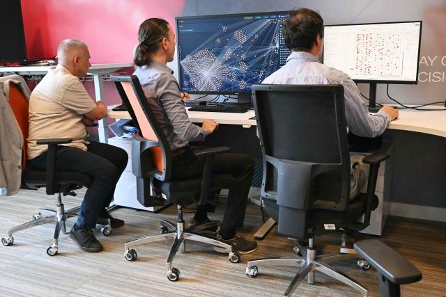Officials of 'Integritas Hatosag', Hungary's anti-corruption watchdog Integrity Authority, work their office in Budapest, Hungary, on June 10, 2026. Hungary's government introduced wide-ranging draft anti-corruption legislation on June 9, 2026 as it seeks to implement reforms to access billions of euros in withheld European Union funds. (Photo by Attila KISBENEDEK / AFP)