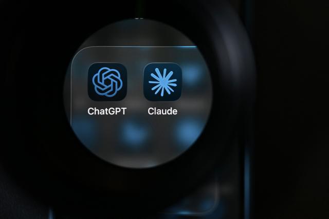 This photograph shows the app logos of artificial intelligence (AI) assistants ChatGPT by US Company OpenAI and Claude by US AI safety and research company Anthropic displayed on a smartphone's screen, in Brussels on June 10, 2026. (Photo by Nicolas TUCAT / AFP)