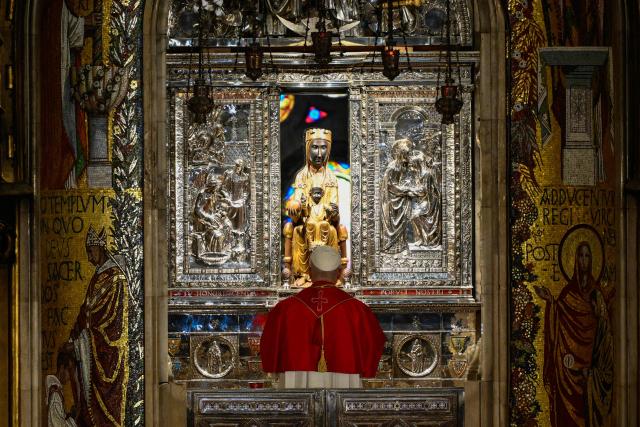 Pope Leo XIV stands in front of the Virgin of Montserrat at the Abbey of Our Lady of Montserrat, near Barcelona, on June 10, 2026. Pope Leo XIV is visiting Spain June 6-12 with stops in Madrid, Barcelona, and the Canary Islands, where he will meet with migrants and organisations dedicated to helping them. (Photo by Ander Gillenea / AFP)
