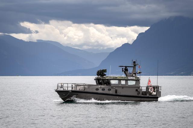 This photograph shows a Swiss military boat patrolling on Lake Geneva ahead of the upcoming G7 summit set to take place near Evian, in Lausanne, on June 10, 2026. (Photo by Fabrice COFFRINI / AFP)