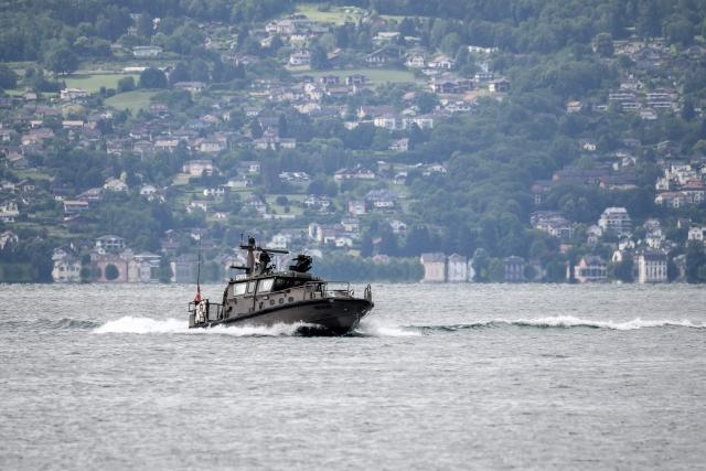 This photograph shows a Swiss military boat patrolling on Lake Geneva ahead of the upcoming G7 summit set to take place near Evian, in Lausanne, on June 10, 2026. (Photo by Fabrice COFFRINI / AFP)