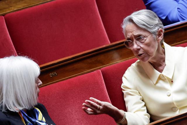 Ensemble Pour la Republique's MP Elisabeth Borne (R) discusses during a session of questions to the government at The National Assembly, France's lower house of parliament in Paris on June 10, 2026. (Photo by STEPHANE DE SAKUTIN / AFP)