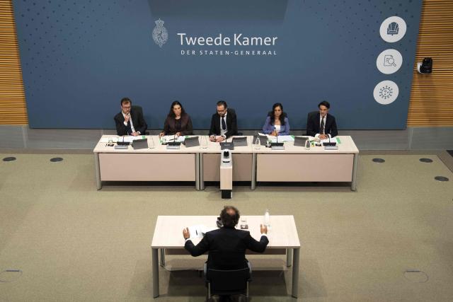 Former Dutch Minister of Social Affairs and Employment Wouter Koolmees (bottom c) takes part in the public hearings of the parliamentary inquiry committee into the coronavirus policy in The Hague on June 10, 2026. (Photo by Jeroen Jumelet / ANP / AFP) / Netherlands OUT