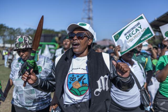 A supporter from the uMkhonto we Sizwe (MK) Party sings and chants slogans during a protest in Durban on June 10, 2026. (Photo by RAJESH JANTILAL / AFP)