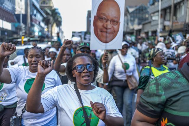 Supporters of the uMkhonto we Sizwe (MK) Party march through the streets of central Durban during a protest march in Durban on June 10, 2026. (Photo by RAJESH JANTILAL / AFP)