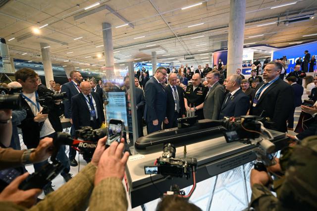 Commander-in-Chief of the Russian Navy, Admiral Alexander Moiseyev and other officials attend the International Maritime Defence Show "Fleet" 2026 in Kronstadt on June 10, 2026. (Photo by Olga MALTSEVA / AFP)