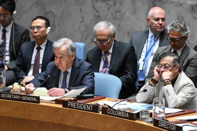 (L/R) UN Secretary General Antonio Guterres speaks as President of Colombia Gustavo Petro looks on during a United Nations Security Council meeting on the Middle East, at UN Headquarters in New York, on June 10, 2026. Colombian President Gustavo Petro is in New York to chair the UN open debate on the Middle East. (Photo by ANGELA WEISS / AFP)