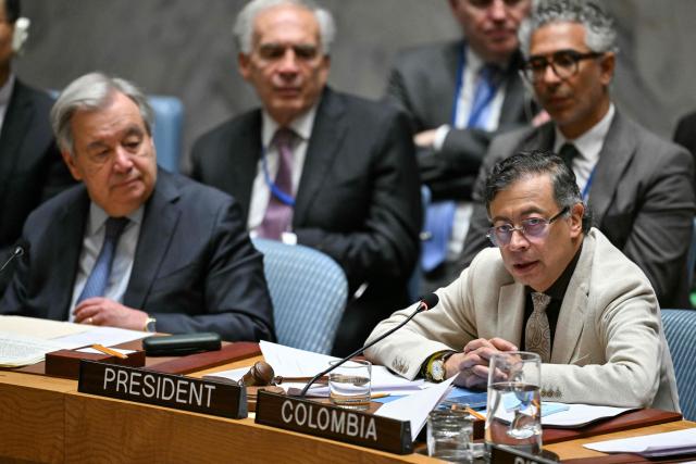 (L/R) UN Secretary General Antonio Guterres looks on as President of Colombia Gustavo Petro speaks during a United Nations Security Council meeting on the Middle East, at UN Headquarters in New York, on June 10, 2026. Colombian President Gustavo Petro is in New York to chair the UN open debate on the Middle East. (Photo by ANGELA WEISS / AFP)