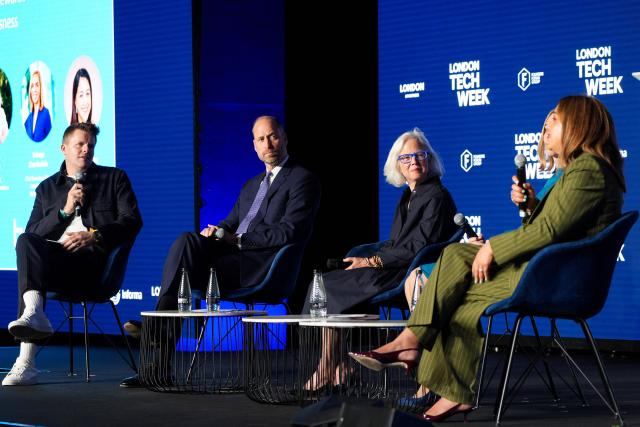 Britain's Prince William, Prince of Wales (2nd L) takes part in a panel discussion with host, English broadcaster Jake Humphrey (L), Linda Gibbs (C), Solange Chamberlain (2nd R-obscured) and Zahra Bahrololoumi (R) at London Tech Week in London on June 10, 2026, to highlight the role of data and technology in preventing homelessness. (Photo by Aaron Chown / POOL / AFP)