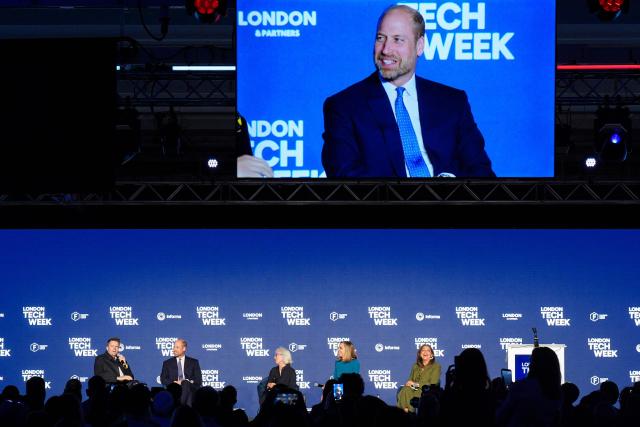 Britain's Prince William, Prince of Wales (2nd L) takes part in a panel discussion with host, English broadcaster Jake Humphrey (L), Linda Gibbs (C), Solange Chamberlain (2nd R) and Zahra Bahrololoumi (R) at London Tech Week in London on June 10, 2026, to highlight the role of data and technology in preventing homelessness. (Photo by Aaron Chown / POOL / AFP)