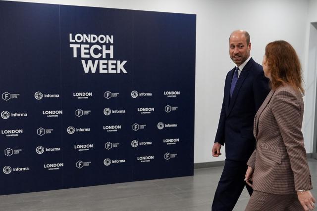 Britain's Prince William, Prince of Wales (2nd R) arrives to attend London Tech Week in London on June 10, 2026, to highlight the role of data and technology in preventing homelessness. (Photo by Aaron Chown / POOL / AFP)