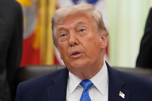 US President Donald Trump speaks during a signing ceremony for the "Secure America Act" in the Oval Office of the White House in Washington, DC, on June 10, 2026. The bill provides around $38 billion for Immigration and Customs Enforcement (ICE), $26 billion for Border Patrol and another $5 billion for unforeseen costs, effectively ensuring a steady flow of money for Trump's deportation agenda through fiscal 2029. (Photo by Ken Cedeno / AFP)
