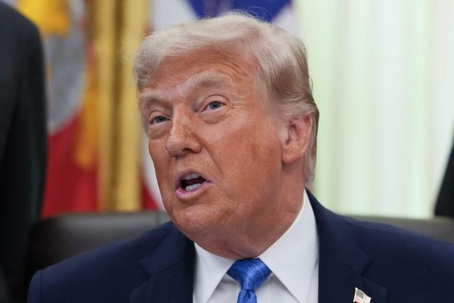 US President Donald Trump speaks during a signing ceremony for the "Secure America Act" in the Oval Office of the White House in Washington, DC, on June 10, 2026. The bill provides around $38 billion for Immigration and Customs Enforcement (ICE), $26 billion for Border Patrol and another $5 billion for unforeseen costs, effectively ensuring a steady flow of money for Trump's deportation agenda through fiscal 2029. (Photo by Ken Cedeno / AFP)