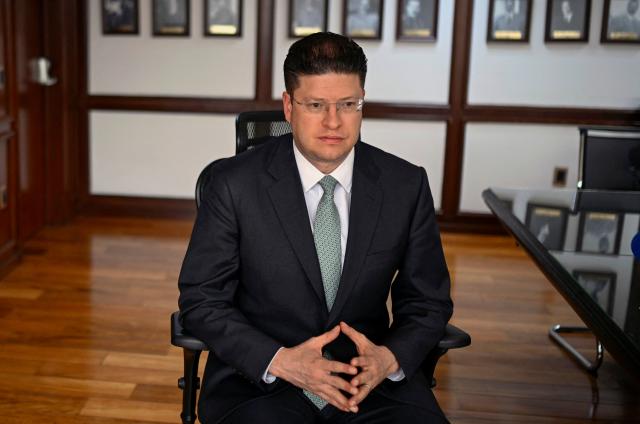Secretary of Citizen Security of Mexico City, Pablo Vazquez, listens a question during an interview with AFP in Mexico City on June 4, 2026. Mexican authorities say they are ready to guarantee security for the World Cup, which kicks off on June 11. The tournament takes place three and a half months after the death of a powerful drug lord in a military operation that triggered road blockades, vehicle burnings and forced shop closures in retaliation, raising alarm bells. The country is now expecting more than five million visitors for football's biggest tournament. “The city has extensive experience in organising this type of event and handling crowds. There is confidence,” Mexico City police chief Pablo Vazquez told AFP. (Photo by Alfredo ESTRELLA / AFP)