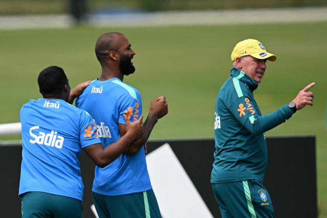 (LtoR) Brazil's forward Endrick and forward Igor Thiago listen to Brazil's Italian head coach Carlo Ancelotti during a training session ahead of Brazil's 2026 FIFA World Cup Group C football match against Morocco in Morris Township on June 10, 2026. (Photo by MAURO PIMENTEL / AFP)