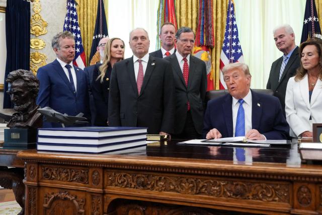 Republican members of Congress look on as US President Donald Trump speaks during a signing ceremony for the "Secure America Act" in the Oval Office of the White House in Washington, DC, on June 10, 2026. The bill provides around $38 billion for Immigration and Customs Enforcement (ICE), $26 billion for Border Patrol and another $5 billion for unforeseen costs, effectively ensuring a steady flow of money for Trump's deportation agenda through fiscal 2029. (Photo by Ken Cedeno / AFP)