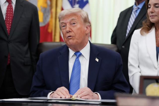 US President Donald Trump speaks during a signing ceremony for the "Secure America Act" in the Oval Office of the White House in Washington, DC, on June 10, 2026. The bill provides around $38 billion for Immigration and Customs Enforcement (ICE), $26 billion for Border Patrol and another $5 billion for unforeseen costs, effectively ensuring a steady flow of money for Trump's deportation agenda through fiscal 2029. (Photo by Ken Cedeno / AFP)