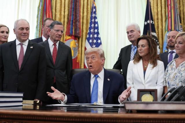 US President Donald Trump speaks during a signing ceremony for the "Secure America Act" in the Oval Office of the White House in Washington, DC, on June 10, 2026. The bill provides around $38 billion for Immigration and Customs Enforcement (ICE), $26 billion for Border Patrol and another $5 billion for unforeseen costs, effectively ensuring a steady flow of money for Trump's deportation agenda through fiscal 2029. (Photo by Ken Cedeno / AFP)