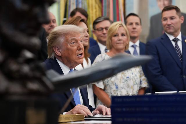 US President Donald Trump speaks during a signing ceremony for the "Secure America Act" in the Oval Office of the White House in Washington, DC, on June 10, 2026. The bill provides around $38 billion for Immigration and Customs Enforcement (ICE), $26 billion for Border Patrol and another $5 billion for unforeseen costs, effectively ensuring a steady flow of money for Trump's deportation agenda through fiscal 2029. (Photo by Ken Cedeno / AFP)