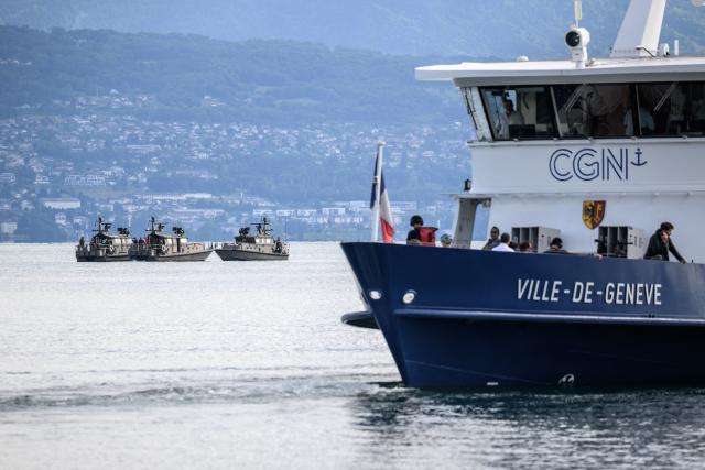 Swiss military boats patrols Lake Geneva alongside a commercial vessel of the General Navigation Company on Lake Geneva (CGN) ahead of the upcoming G7 summit in nearby Evian, in Lausanne, on June 10, 2026. (Photo by Fabrice COFFRINI / AFP)