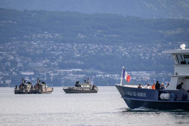 Swiss military boats patrols Lake Geneva alongside a commercial vessel of the General Navigation Company on Lake Geneva (CGN) ahead of the upcoming G7 summit in nearby Evian, in Lausanne, on June 10, 2026. (Photo by Fabrice COFFRINI / AFP)