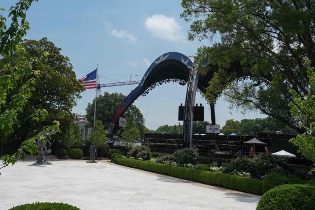 The arena for the upcoming UFC match on the South Lawn is seen from the Rose Garden of the White House, on June 10, 2026 in Washington, DC. The bill provides around $38 billion for Immigration and Customs Enforcement (ICE), $26 billion for Border Patrol and another $5 billion for unforeseen costs, effectively ensuring a steady flow of money for Trump's deportation agenda through fiscal 2029. (Photo by Ken Cedeno / AFP)