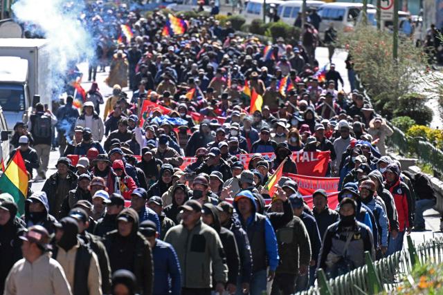 Demonstrators march to protest against the government of Bolivia's President Rodrigo Paz in La Paz on June 10, 2026. For weeks, protesters demanding that US-backed conservative President Rodrigo Paz's fledgling government address a deep economic crisis, while others called for his resignation, have marched and set up roadblocks, bringing Bolivia to a near standstill, driving up food and fuel prices and causing shortages of basic goods. (Photo by MARVIN RECINOS / AFP)