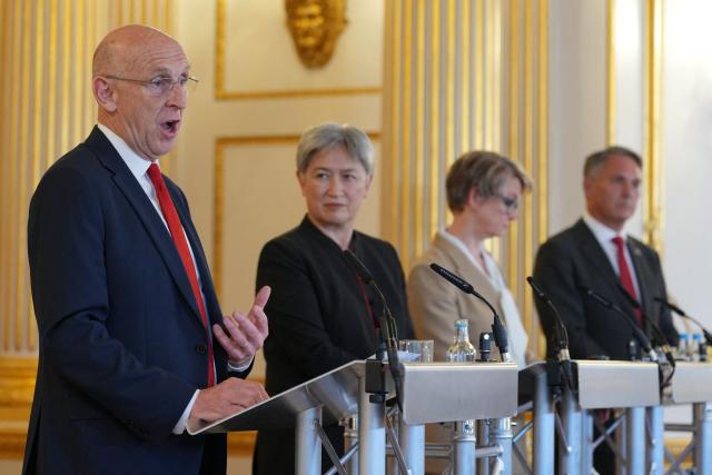 Britain's Defence Secretary John Healey (L), Australia's Minister for Foreign Affairs Penny Wong (2L), Britain's Foreign Secretary Yvette Cooper (2R), and Australia's Deputy Prime Minister and Minister for Defence Richard Marles, attend a joint press conference during the annual Australia-UK Ministerial Consultations (AUKMIN) meeting at Lancaster House in London on June 10, 2026. (Photo by Kin Cheung / POOL / AFP)