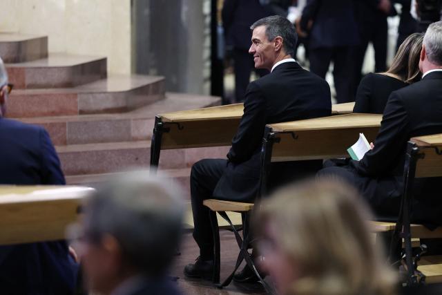 Prime Minister Pedro Sanchez smiles as he awaits the arrival of Pope Leo XIV to lead Holy Mass and the inauguration of the Jesus Christ tower in the Basilica of the Sagrada Familia in Barcelona, on June 10, 2026. Pope Leo XIV is visiting Spain June 6-12 with stops in Madrid, Barcelona, and the Canary Islands, where he will meet with migrants and organisations dedicated to helping them. (Photo by Josep LAGO / AFP)