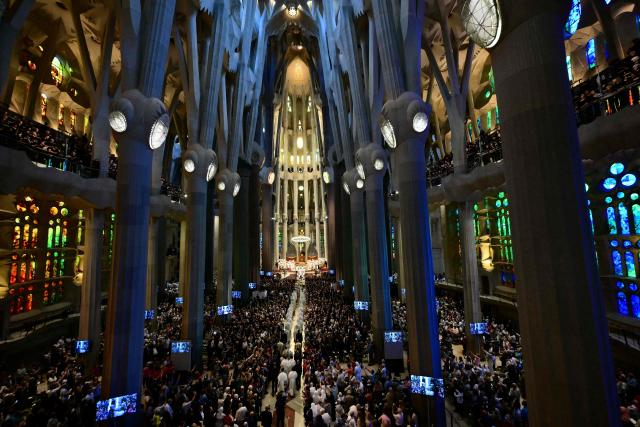 Bishops arrive to concelebrate Holy Mass with Pope Leo XIV in the Basilica of the Sagrada Familia and inauguration of the Jesus Christ tower in Barcelona, on June 10, 2026. Pope Leo XIV is visiting Spain June 6-12 with stops in Madrid, Barcelona, and the Canary Islands, where he will meet with migrants and organisations dedicated to helping them. (Photo by Stefano RELLANDINI / AFP)