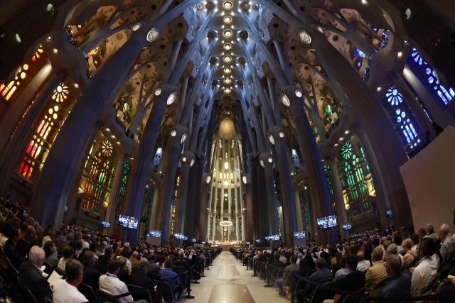 People attend Holy Mass led by Pope Leo XIV in the Basilica of the Sagrada Familia in Barcelona, on June 10, 2026. Pope Leo XIV is visiting Spain June 6-12 with stops in Madrid, Barcelona, and the Canary Islands, where he will meet with migrants and organisations dedicated to helping them. (Photo by Josep LAGO / AFP)