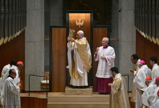Pope Leo XIV (C) leads a Holy Mass in the Basilica of the Sagrada Familia and the inauguration of the Jesus Christ tower in Barcelona, on June 10, 2026. Pope Leo XIV is visiting Spain June 6-12 with stops in Madrid, Barcelona, and the Canary Islands, where he will meet with migrants and organisations dedicated to helping them. (Photo by Stefano RELLANDINI / AFP)