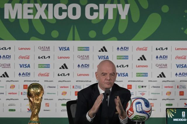 FIFA President Gianni Infantino gives a press conference with the World Cup trophy on the eve of the opening match of the 2026 World Cup football tournament at Mexico city stadium in Mexico City on June 10, 2026. (Photo by Alfredo ESTRELLA / AFP)
