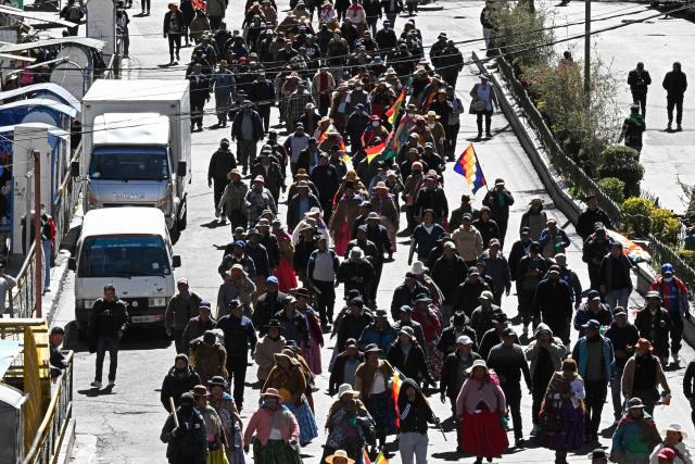 Demonstrators march to protest against the government of Bolivia's President Rodrigo Paz in La Paz on June 10, 2026. For weeks, protesters demanding that US-backed conservative President Rodrigo Paz's fledgling government address a deep economic crisis, while others called for his resignation, have marched and set up roadblocks, bringing Bolivia to a near standstill, driving up food and fuel prices and causing shortages of basic goods. (Photo by AIZAR RALDES / AFP)