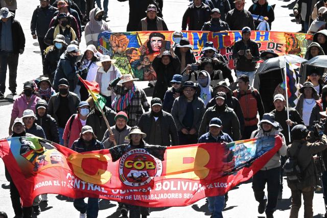 Demonstrators march to protest against the government of Bolivia's President Rodrigo Paz in La Paz on June 10, 2026. For weeks, protesters demanding that US-backed conservative President Rodrigo Paz's fledgling government address a deep economic crisis, while others called for his resignation, have marched and set up roadblocks, bringing Bolivia to a near standstill, driving up food and fuel prices and causing shortages of basic goods. (Photo by AIZAR RALDES / AFP)