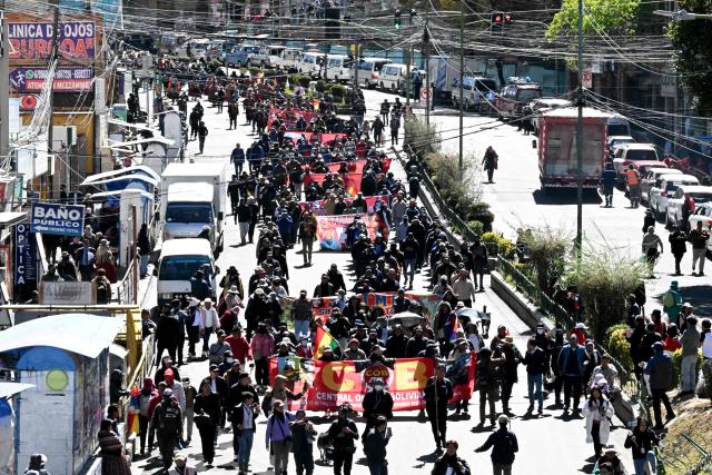 Demonstrators march to protest against the government of Bolivia's President Rodrigo Paz in La Paz on June 10, 2026. For weeks, protesters demanding that US-backed conservative President Rodrigo Paz's fledgling government address a deep economic crisis, while others called for his resignation, have marched and set up roadblocks, bringing Bolivia to a near standstill, driving up food and fuel prices and causing shortages of basic goods. (Photo by AIZAR RALDES / AFP)