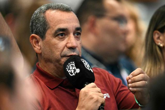 Former Brazilian football player Zinho asks a question to Brazil's forward Raphinha (unseen) during press conference at The Ridge hotel in Basking Ridge, New Jersey on June 10, 2026, ahead of the 2026 World Cup football tournament. (Photo by MAURO PIMENTEL / AFP)