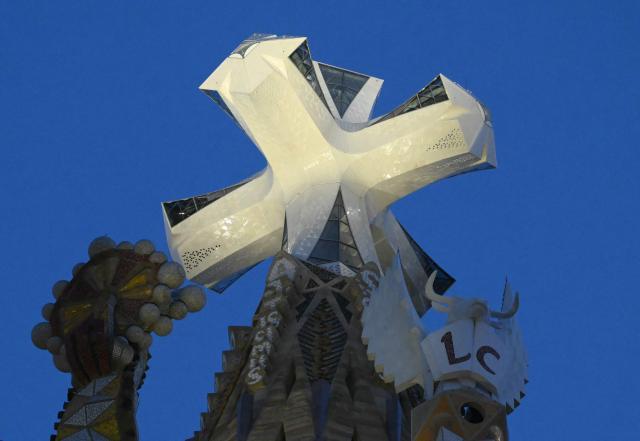 A photo taken in Barcelona, on June 10, 2026 shows a view of the Basilica of the Sagrada Familia during the inauguration of Jesus Christ tower by Pope Leo XIV. Pope Leo XIV is visiting Spain June 6-12 with stops in Madrid, Barcelona, and the Canary Islands, where he will meet with migrants and organisations dedicated to helping them. (Photo by JOSE JORDAN / AFP)