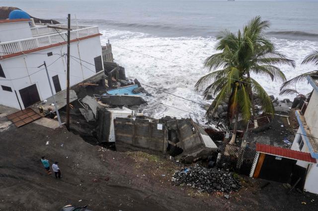 Aerial view show damage caused by rough seas ahead of the arrival of Storm Cristina in Iztapa, Guatemala on June 10, 2026. The countries of Central America remain on alert over the effects of Tropical Storm Cristina, which formed on June 8, 2026 in the Pacific Ocean, civil protection services reported. (Photo by Carlos ALONZO / AFP)