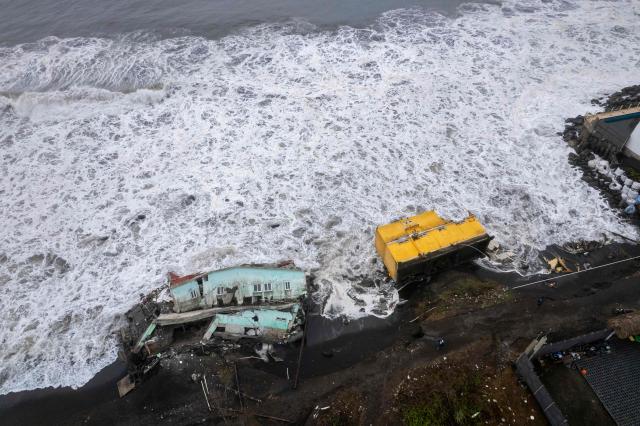 Aerial view showing damage caused by rough seas ahead of the arrival of Storm Cristina in Iztapa, Guatemala on June 10, 2026. The countries of Central America remain on alert over the effects of Tropical Storm Cristina, which formed on June 8, 2026 in the Pacific Ocean, civil protection services reported. (Photo by Carlos ALONZO / AFP)