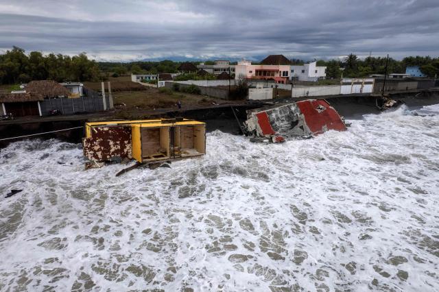 Aerial view showing damage caused by rough seas ahead of the arrival of Storm Cristina in Iztapa, Guatemala on June 10, 2026. The countries of Central America remain on alert over the effects of Tropical Storm Cristina, which formed on June 8, 2026 in the Pacific Ocean, civil protection services reported. (Photo by Carlos ALONZO / AFP)