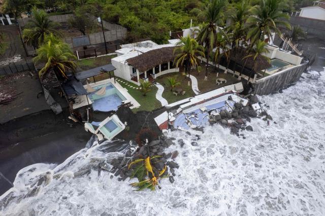 Aerial view showing damage caused by rough seas ahead of the arrival of Storm Cristina in Iztapa, Guatemala on June 10, 2026. The countries of Central America remain on alert over the effects of Tropical Storm Cristina, which formed on June 8, 2026 in the Pacific Ocean, civil protection services reported. (Photo by Carlos ALONZO / AFP)