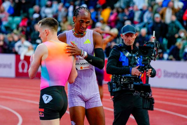 Brazil's Alison Dos Santos wins ahead of Norway's Karsten Warholm (L) in the Men's 400m Hurdles event of the Olso Diamond League athletics meeting in Oslo, Norway, on June 10, 2026. (Photo by Heiko Junge / NTB / AFP) / Norway OUT